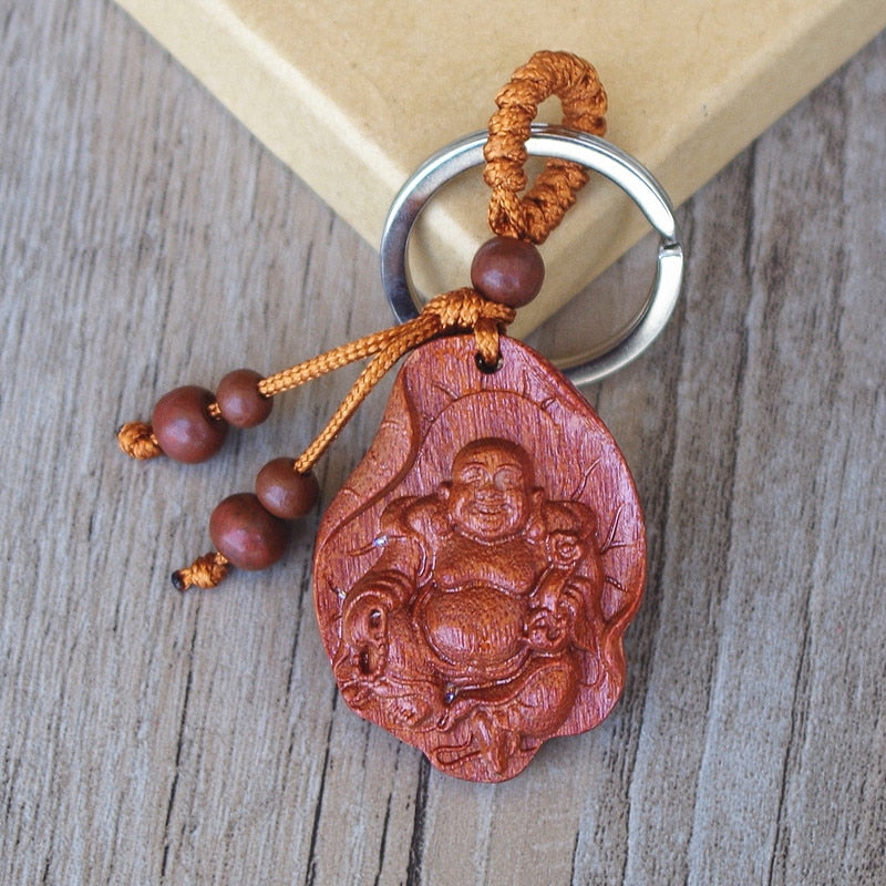 Porte clés Bouddha sur une feuille de lotus
