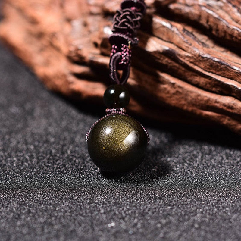 Pendentif "Sphère" en Obsidienne Dorée