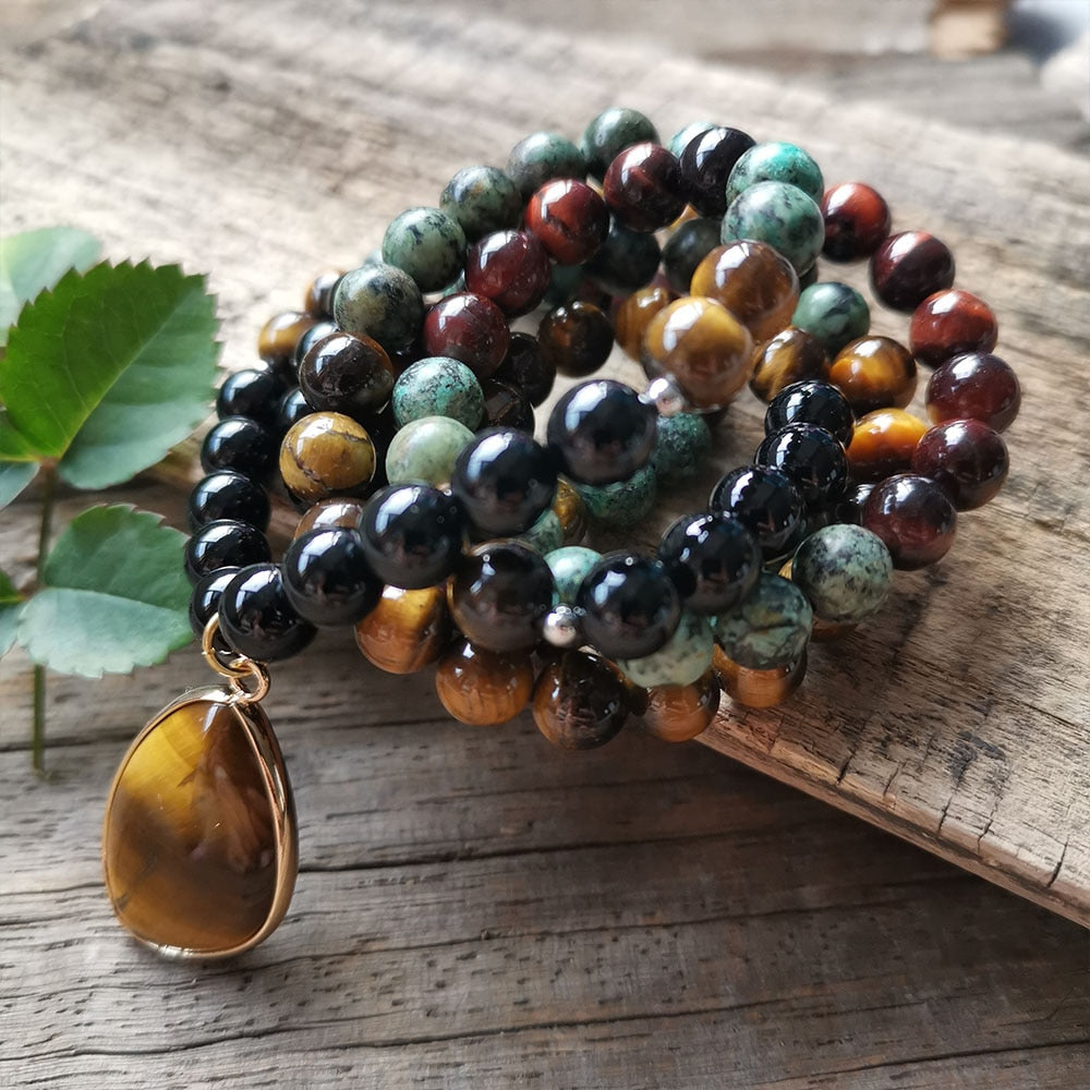 Collier Mala "Énergies Protectrices" en Oeil de Tigre, Oeil de Taureau, Turquoise Africaine & Onyx